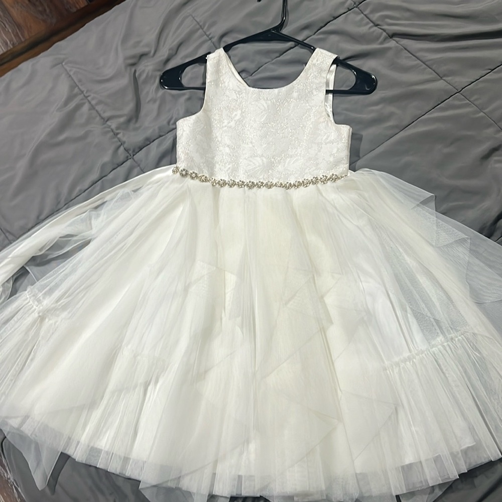 Girls dress ivory used size 8 .